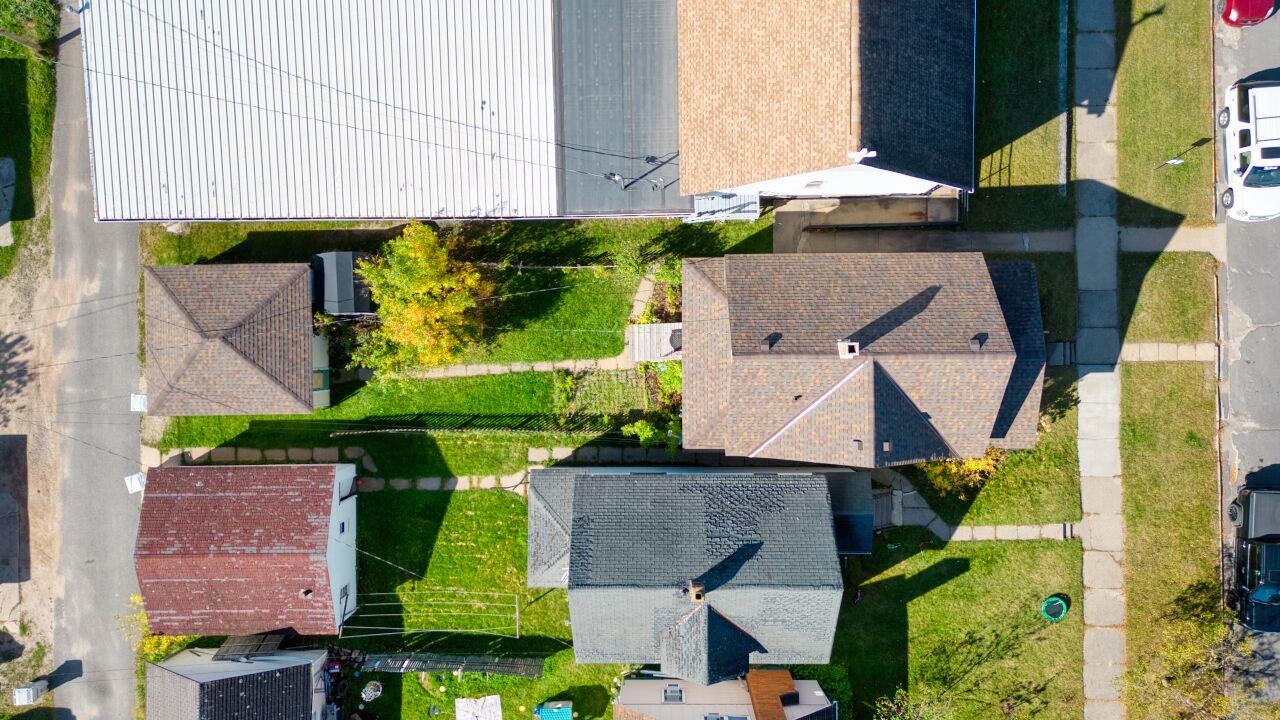 25 3rd Street Southwest Chisholm, MN 55719 - Photo 35 of 44 Aerial perspective of suburban area