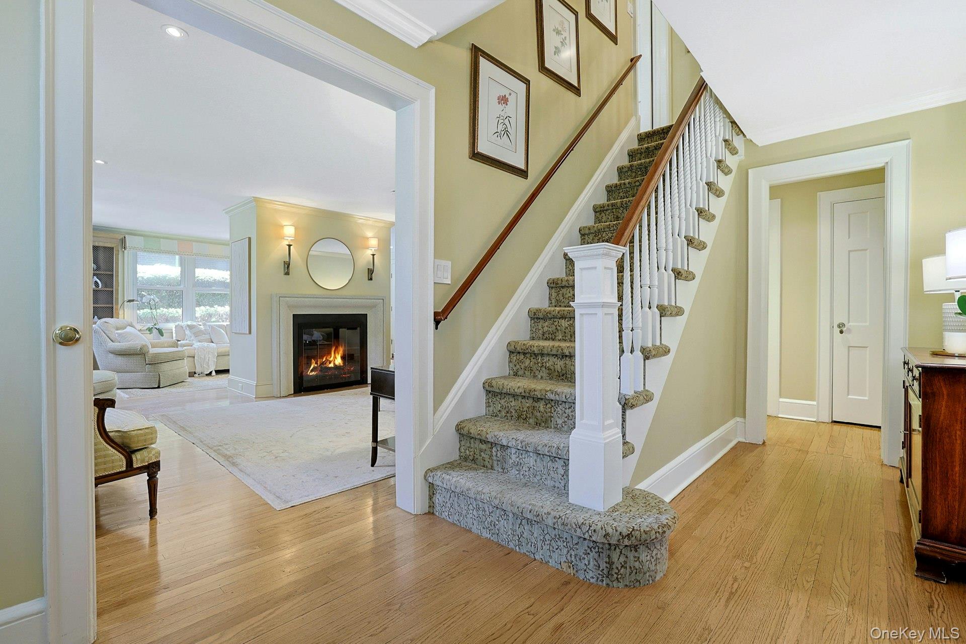 17 Elm Road Scarsdale, NY 10583 - Photo 2 of 38 A pretty center foyer with hardwood floors introduces the home and opens effortlessly to the formal living and dining rooms.