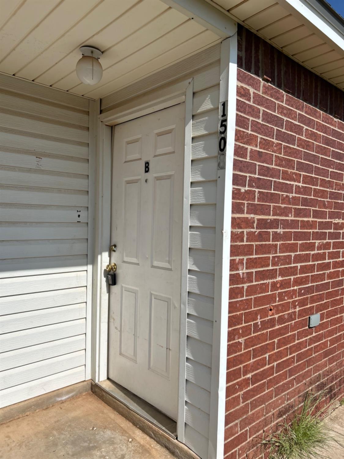 1508 82nd Street, Unit B Lubbock, TX 79423 - Photo 5 of 8 a view of door
