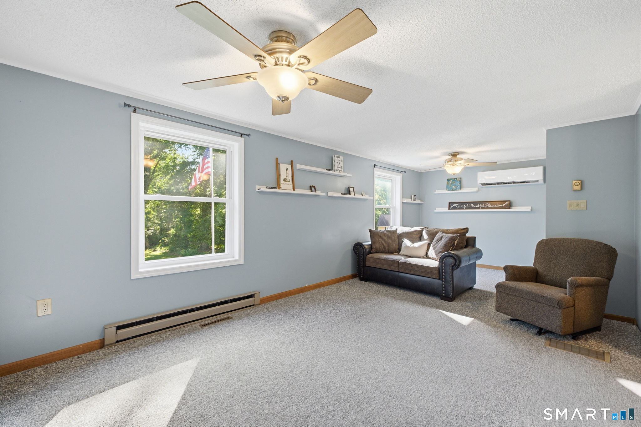 141 Hop River Road Coventry, CT 06238 - Photo 12 of 40 a living room with furniture and a window
