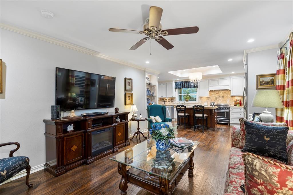 1432 Sylvan Avenue Dallas, TX 75208 - Photo 15 of 40 a living room with furniture and a flat screen tv