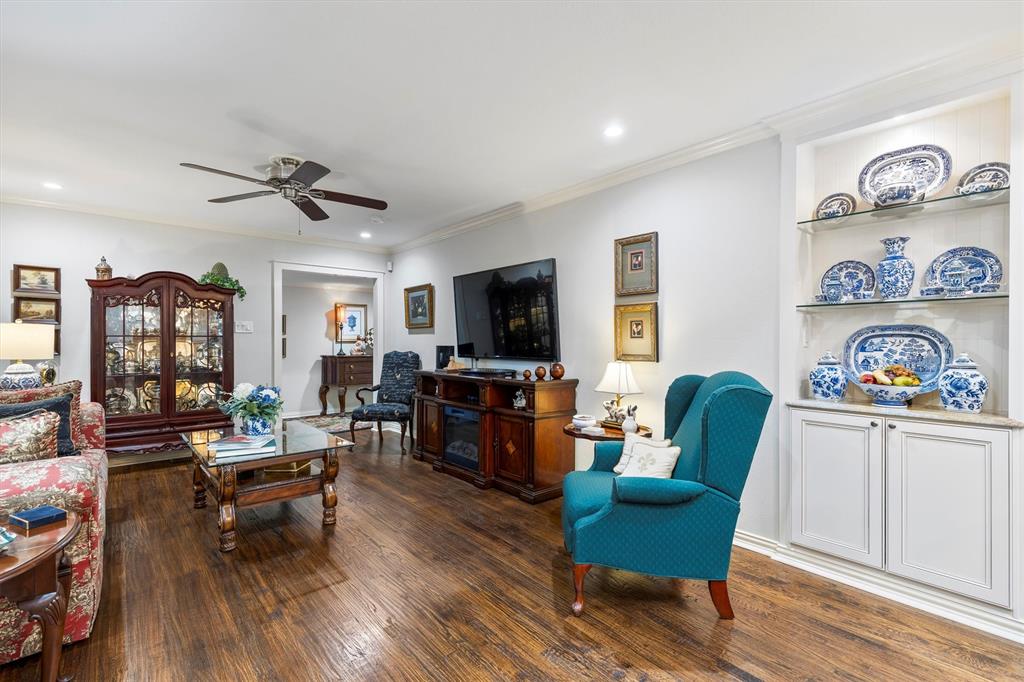 1432 Sylvan Avenue Dallas, TX 75208 - Photo 16 of 40 a living room with furniture and a flat screen tv
