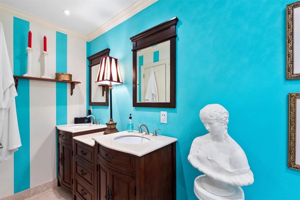 1432 Sylvan Avenue Dallas, TX 75208 - Photo 20 of 40 a bathroom with a sink mirror and toilet