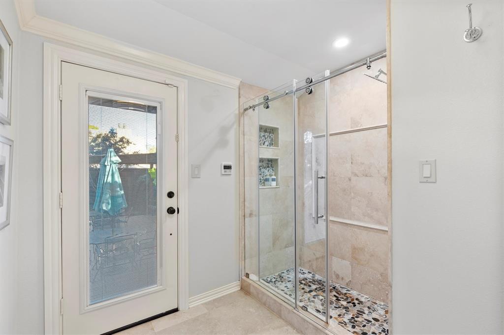 1432 Sylvan Avenue Dallas, TX 75208 - Photo 29 of 40 a bathroom with a shower and a sink