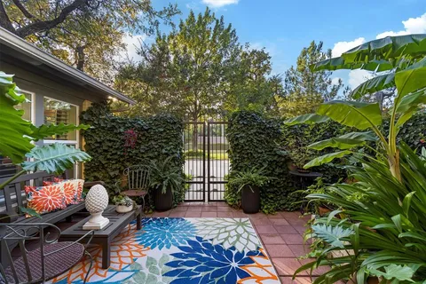 a backyard of a house with seating space