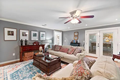 a view of backyard with outdoor seating