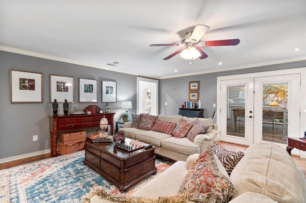 1432 Sylvan Avenue Dallas, TX 75208 - Photo 31 of 40 a living room with furniture and a large window