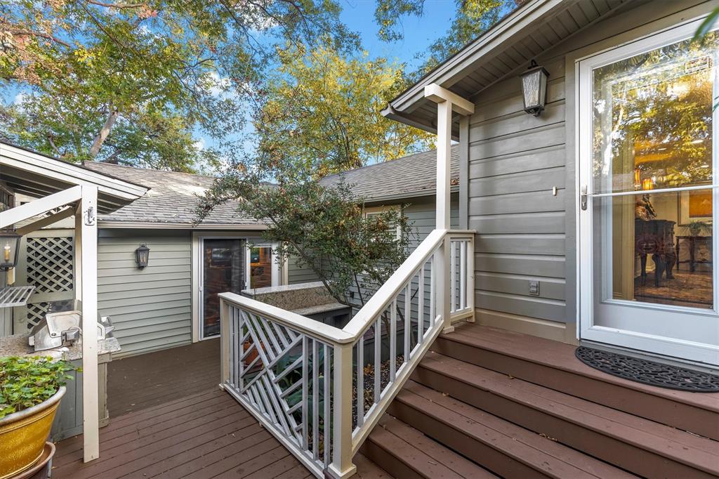 1432 Sylvan Avenue Dallas, TX 75208 - Photo 33 of 40 a view of a house with backyard and deck