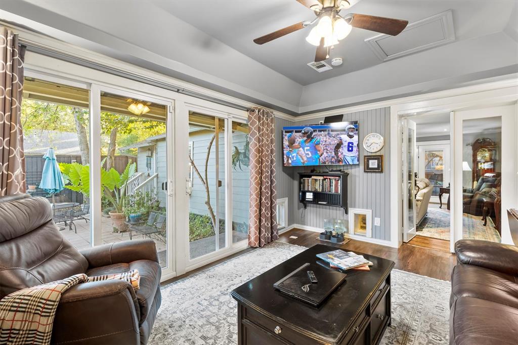 1432 Sylvan Avenue Dallas, TX 75208 - Photo 34 of 40 a living room with furniture and a large window
