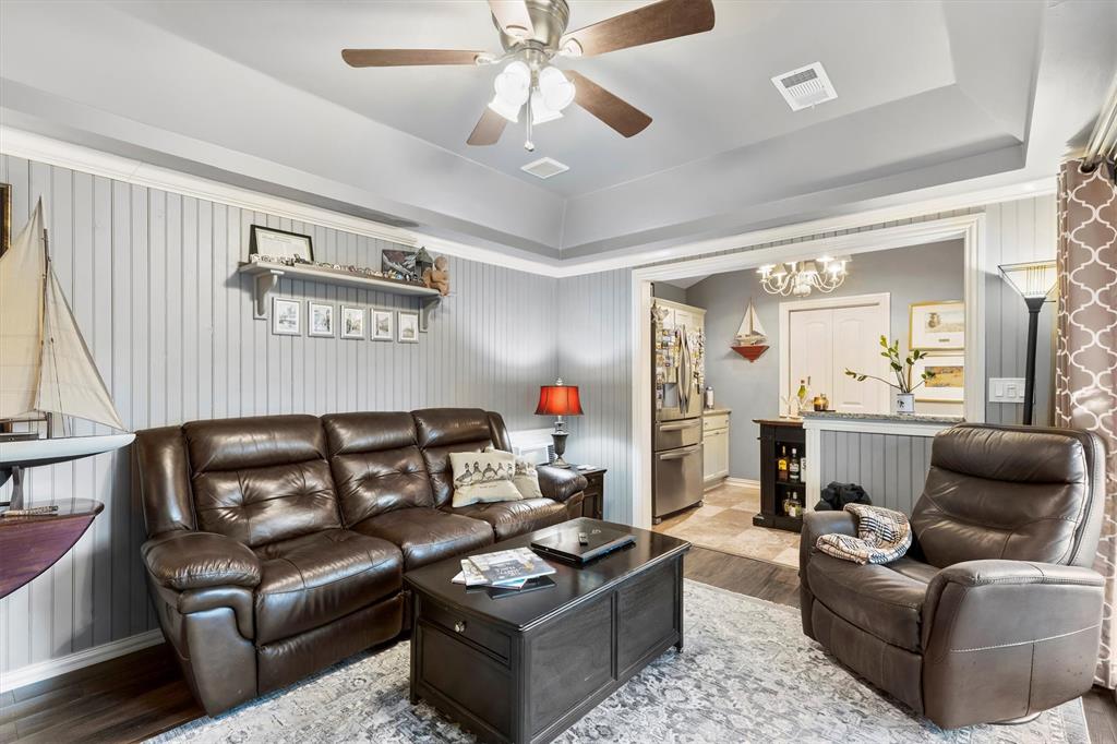 1432 Sylvan Avenue Dallas, TX 75208 - Photo 35 of 40 a living room with furniture and a large window