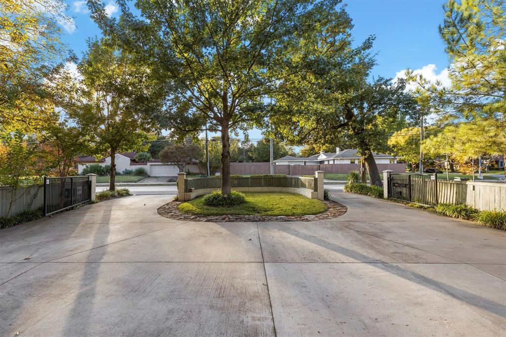 1432 Sylvan Avenue Dallas, TX 75208 - Photo 5 of 40 a view of a park with large trees