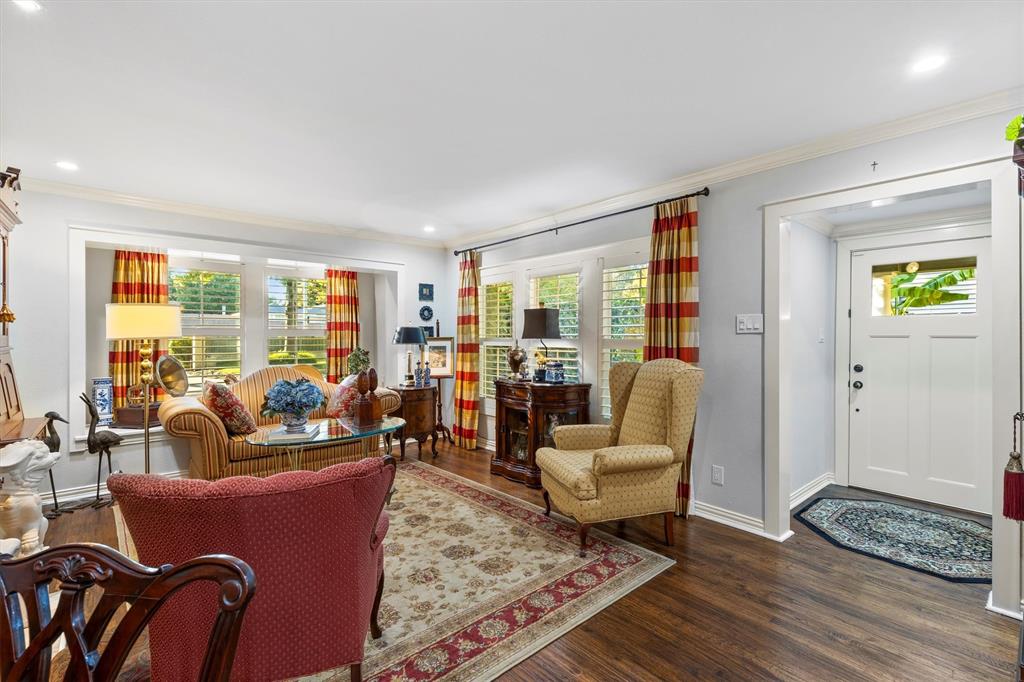 1432 Sylvan Avenue Dallas, TX 75208 - Photo 6 of 40 a living room with furniture rug and wooden floor