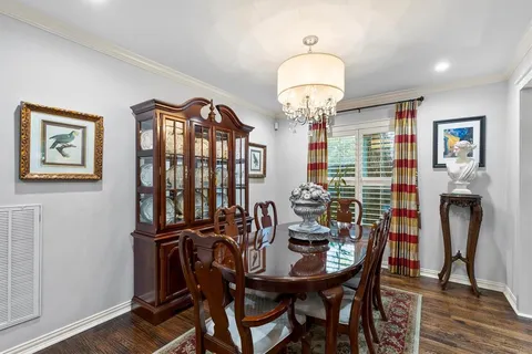 a kitchen with a sink cabinets and window