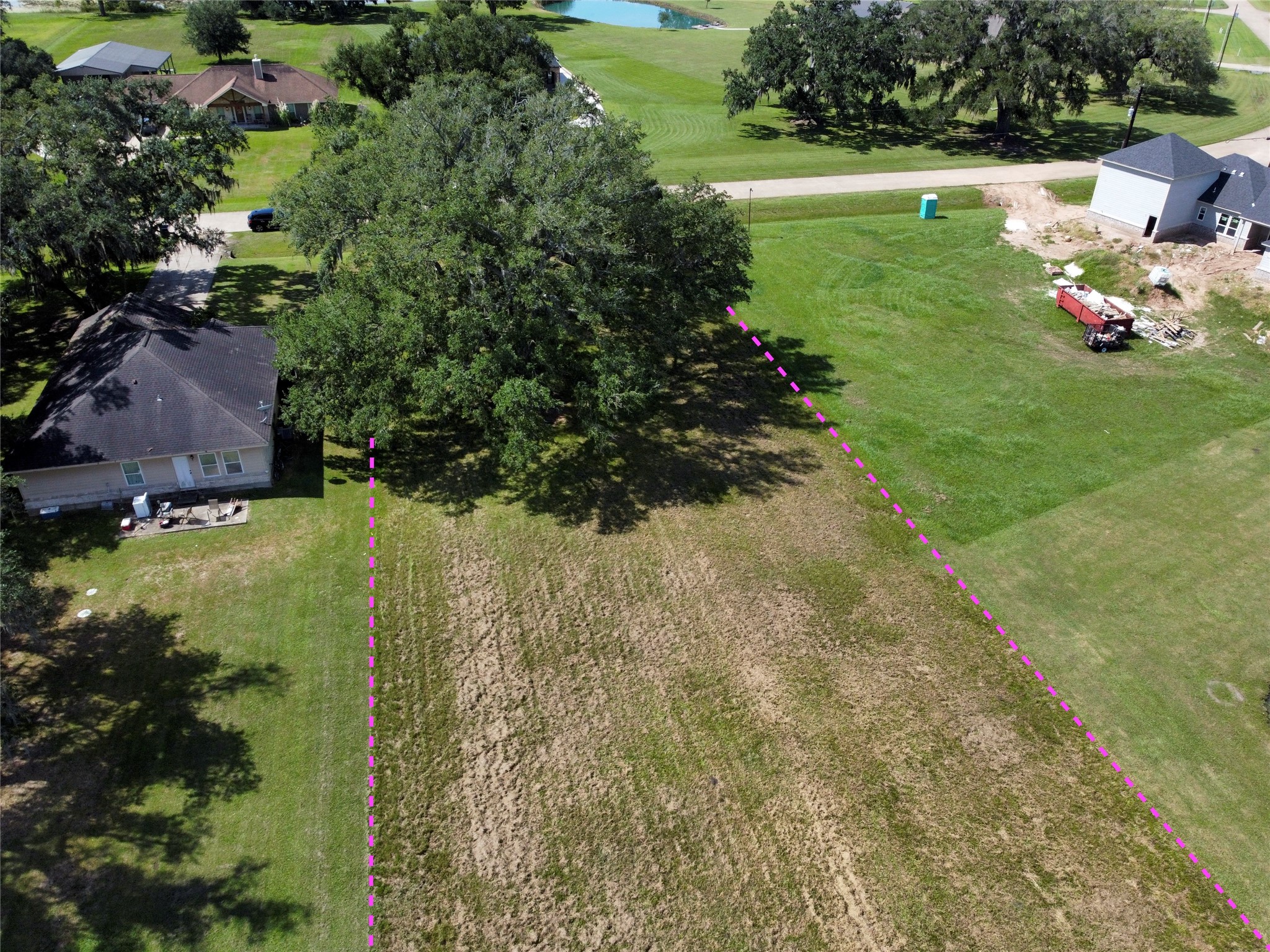 158 Cattle Drive Trail Angleton, TX 77515 - Photo 4 of 18 a view of a garden with lawn chairs