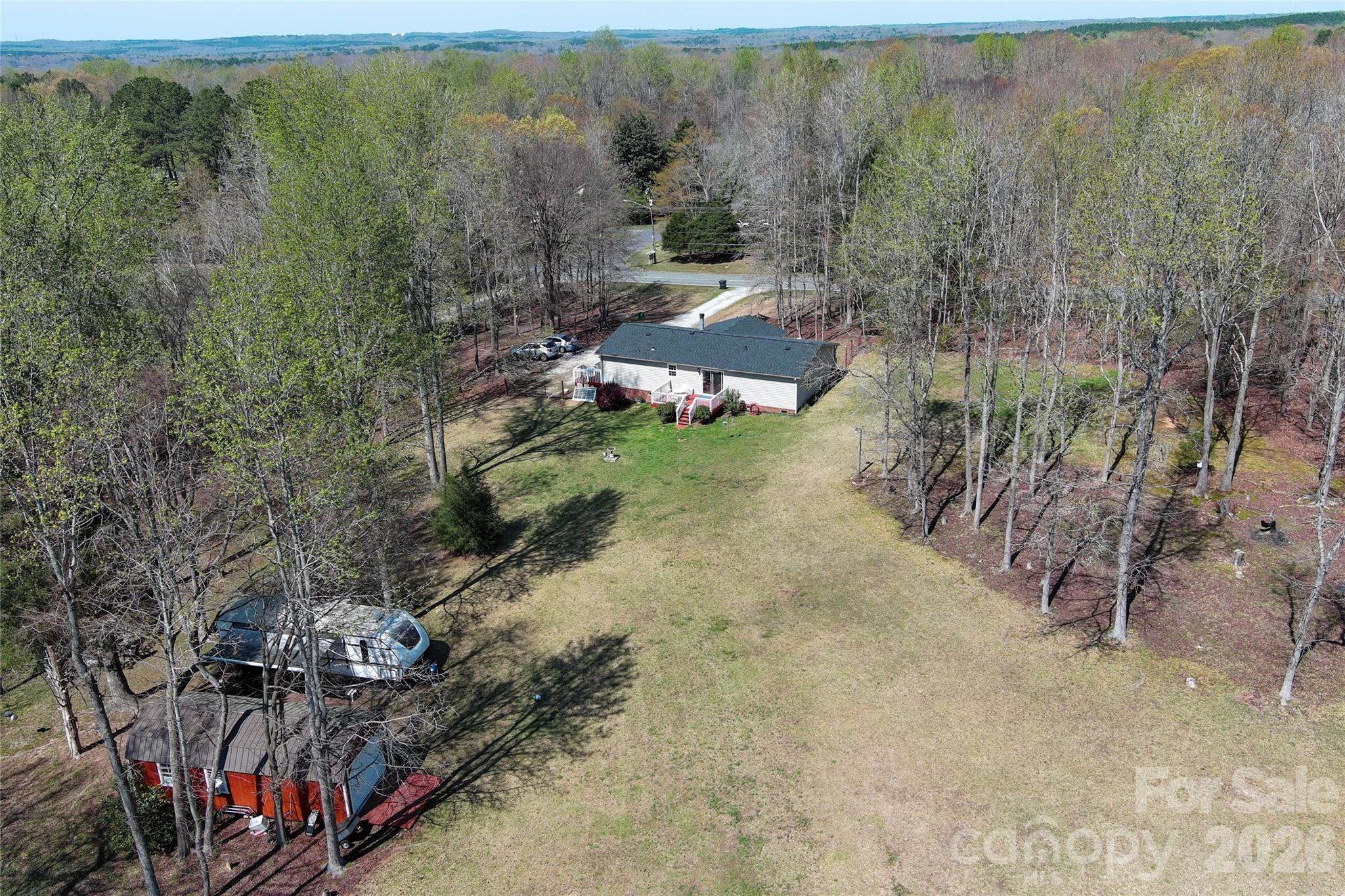7706 Davis Road Waxhaw, NC 28173 - Photo 45 of 45 a view of a forest with a tree