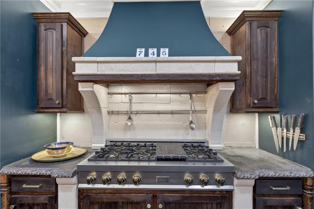745 Goshen Road Thomaston, GA 30286 - Photo 12 of 41 a stove top oven sitting inside of a kitchen