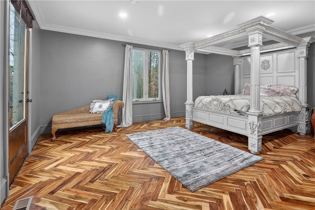 745 Goshen Road Thomaston, GA 30286 - Photo 14 of 41 a bedroom with double bed and a window