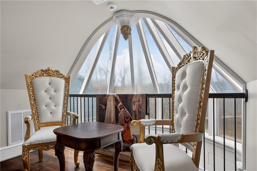 745 Goshen Road Thomaston, GA 30286 - Photo 27 of 41 a view of a dining room with furniture and wooden floor