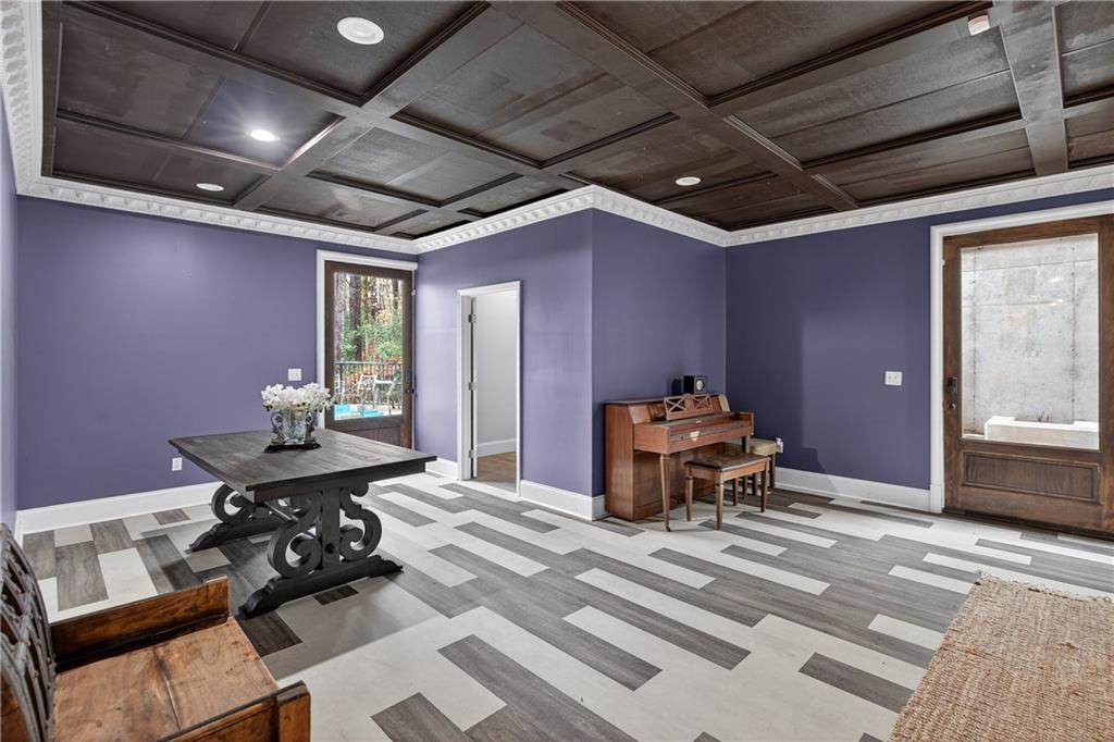 745 Goshen Road Thomaston, GA 30286 - Photo 33 of 41 a living room with furniture and a chandelier