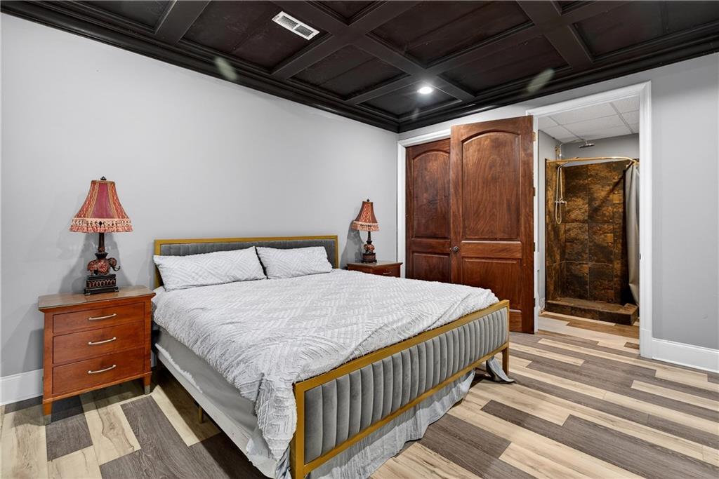 745 Goshen Road Thomaston, GA 30286 - Photo 34 of 41 a bedroom with a bed and a dresser