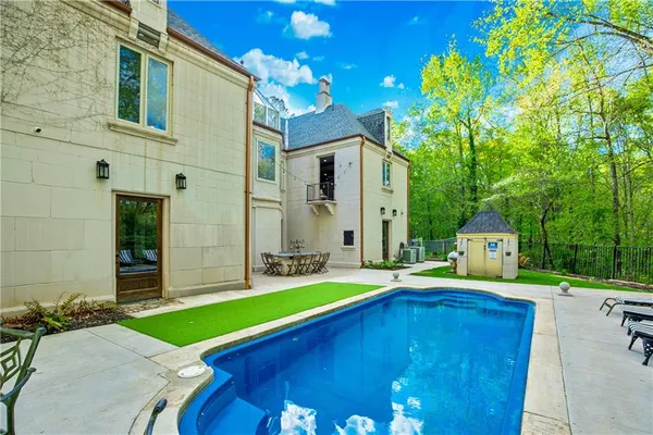 a garden view with a sitting space