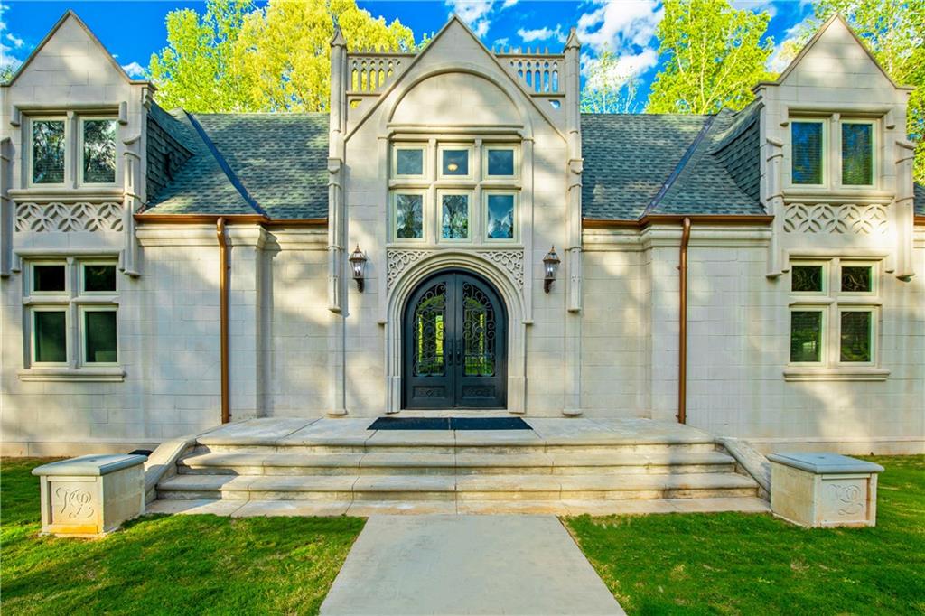 745 Goshen Road Thomaston, GA 30286 - Photo 5 of 41 a front view of a house with garden