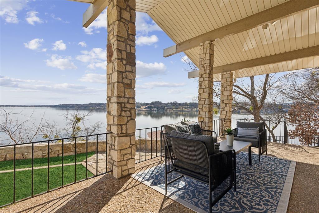 648 South Rough Creek Court Granbury, TX 76048 - Photo 5 of 26 a view of outdoor space with seating area