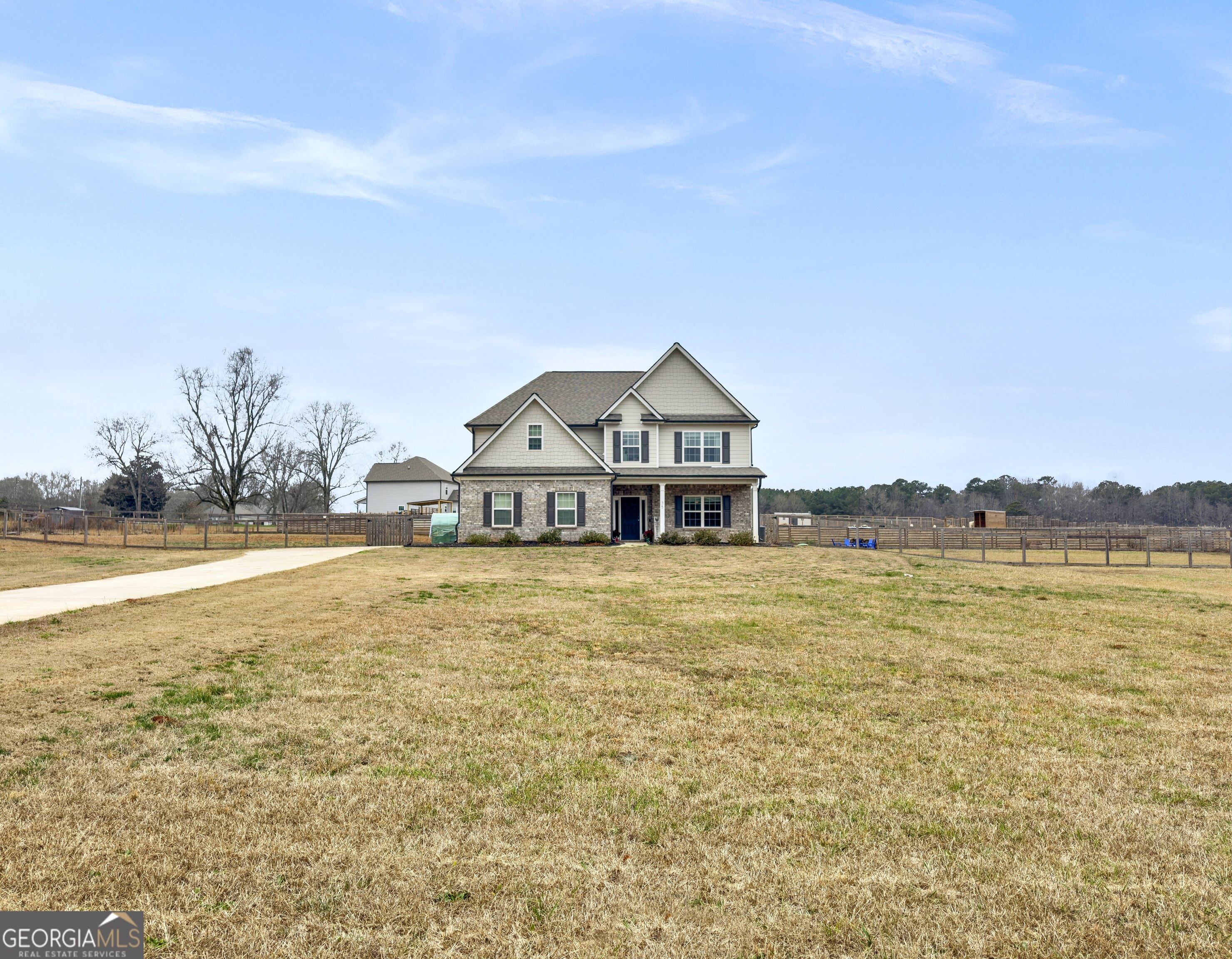 35 Sandy Ridge Road McDonough, GA 30252 - Photo 11 of 63 a front view of a house with a yard