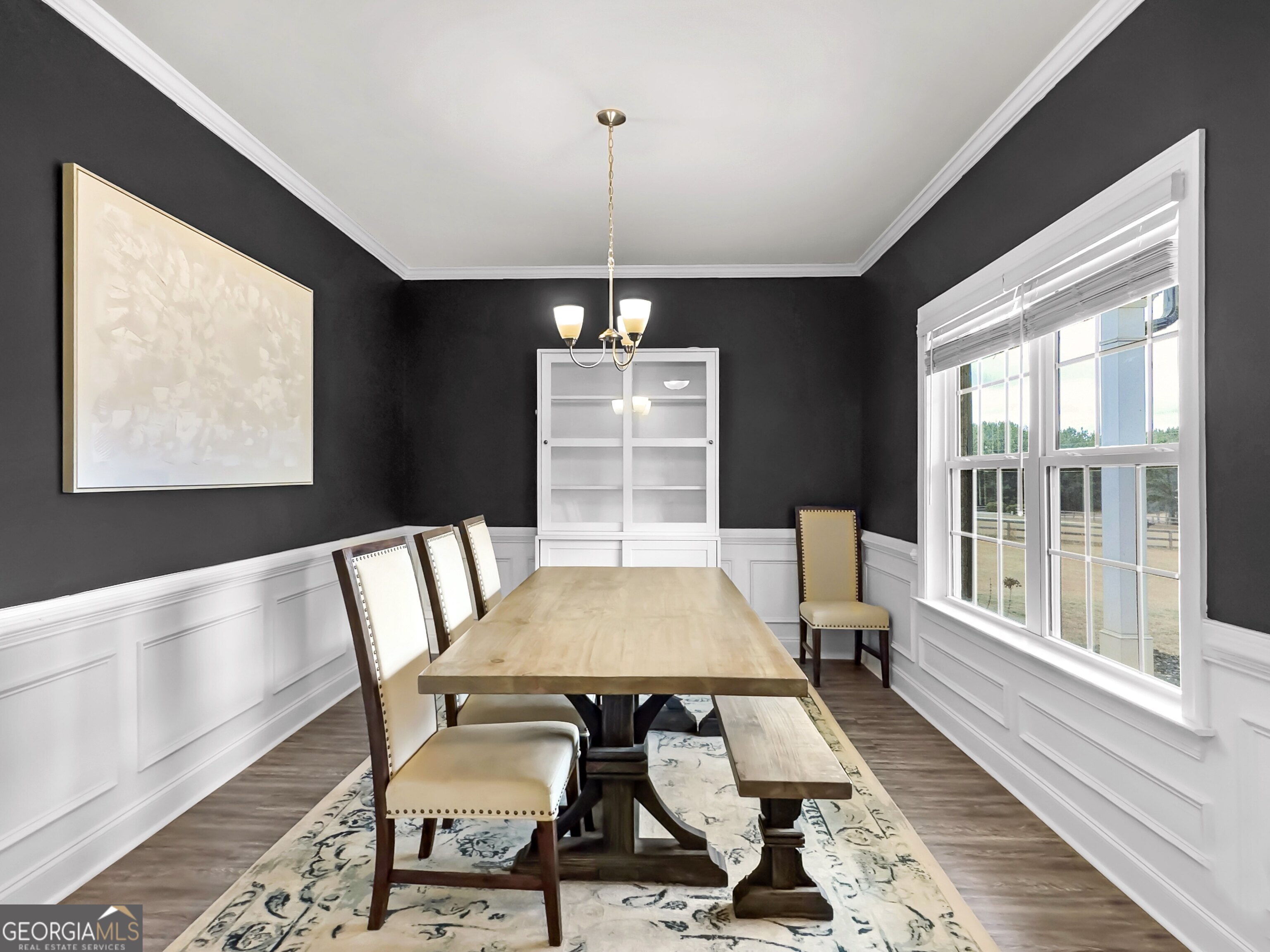 35 Sandy Ridge Road McDonough, GA 30252 - Photo 23 of 63 a view of a dining room with furniture window and wooden floor