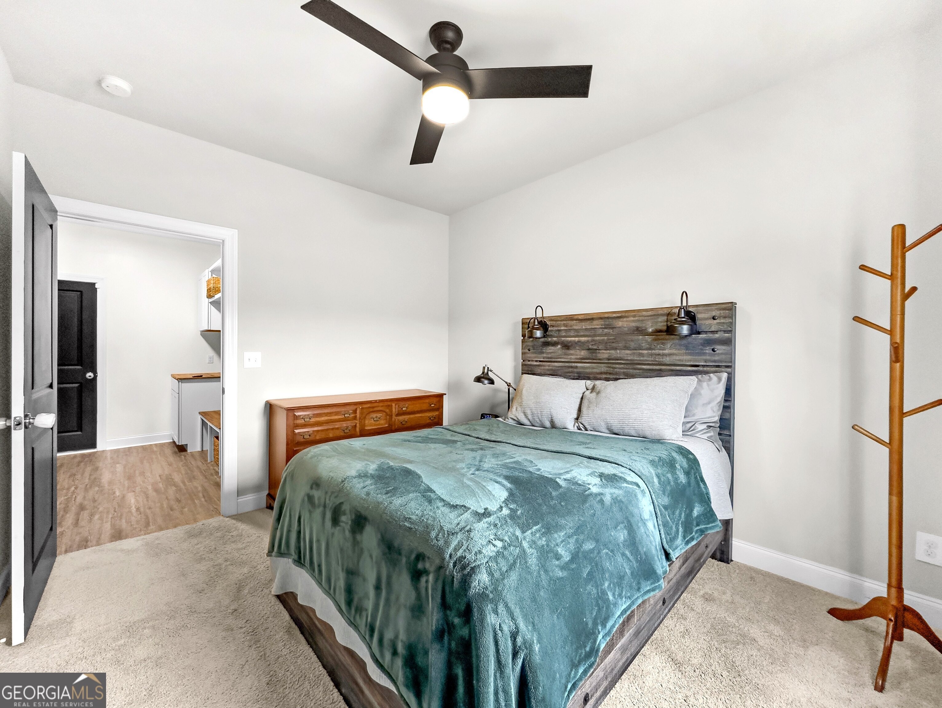 35 Sandy Ridge Road McDonough, GA 30252 - Photo 38 of 63 a bedroom with a bed and a walk in closet