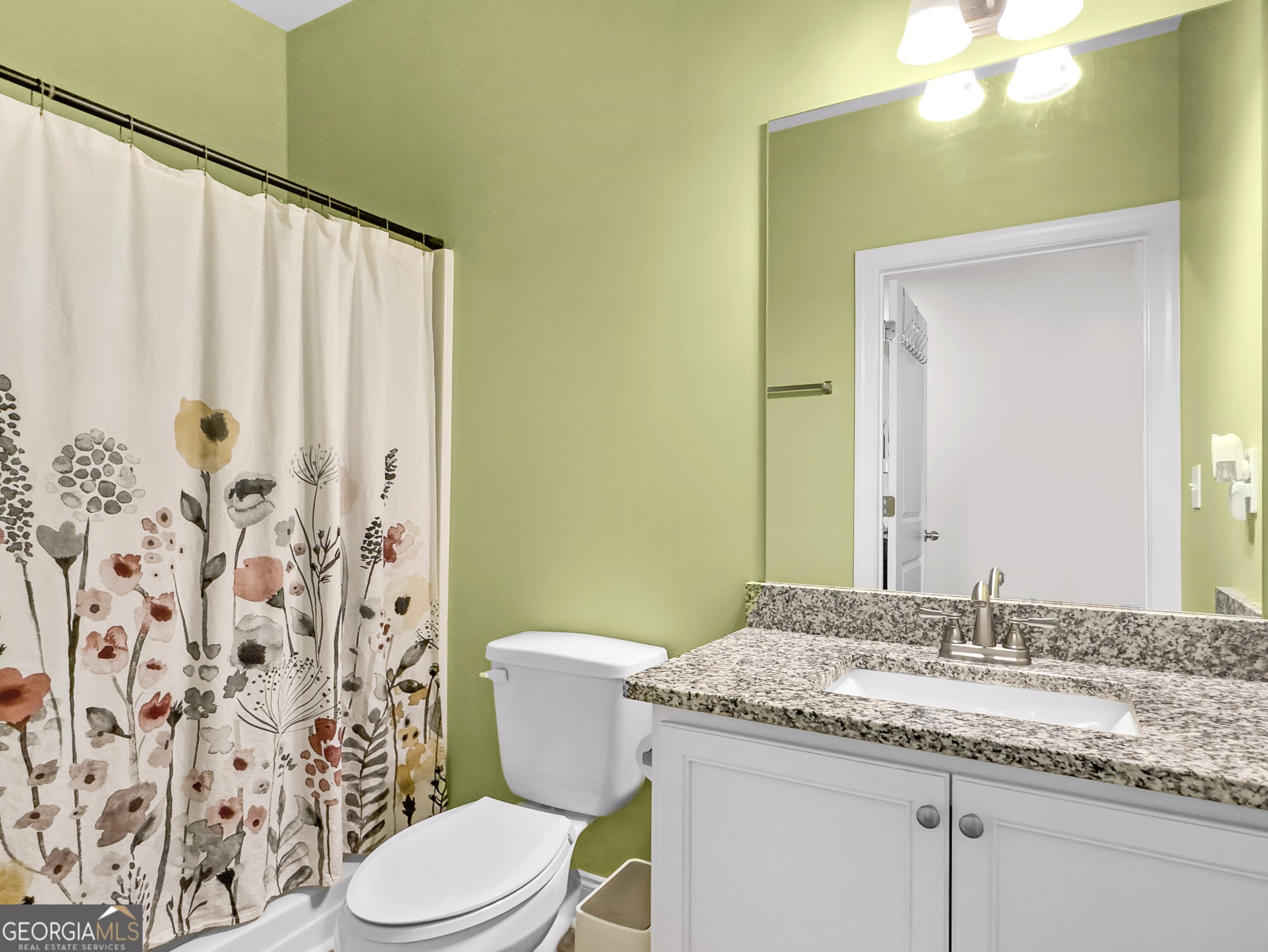 35 Sandy Ridge Road McDonough, GA 30252 - Photo 40 of 63 a bathroom with a granite countertop sink toilet and a mirror
