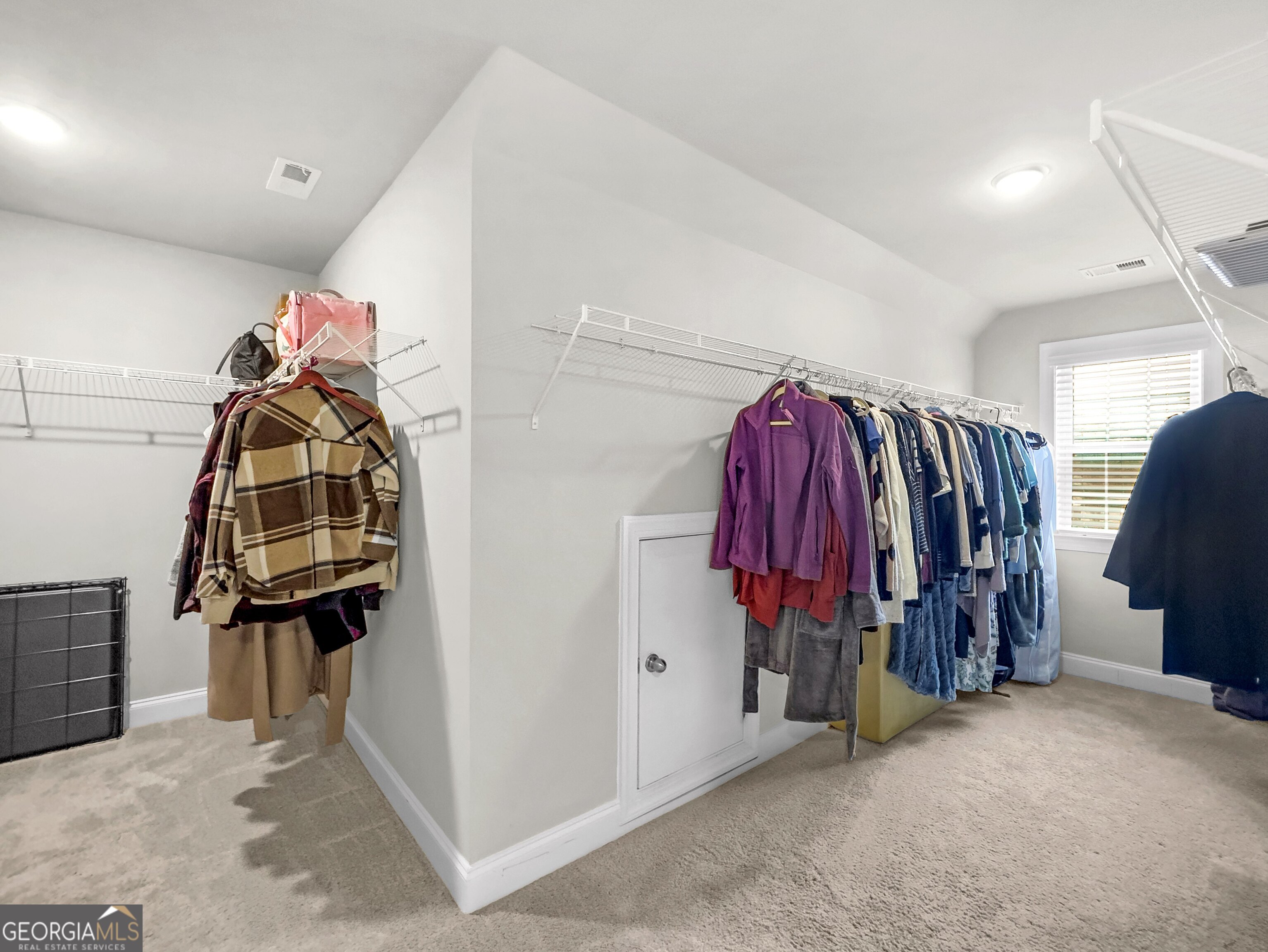 35 Sandy Ridge Road McDonough, GA 30252 - Photo 50 of 63 a view of walk in closet with clothes