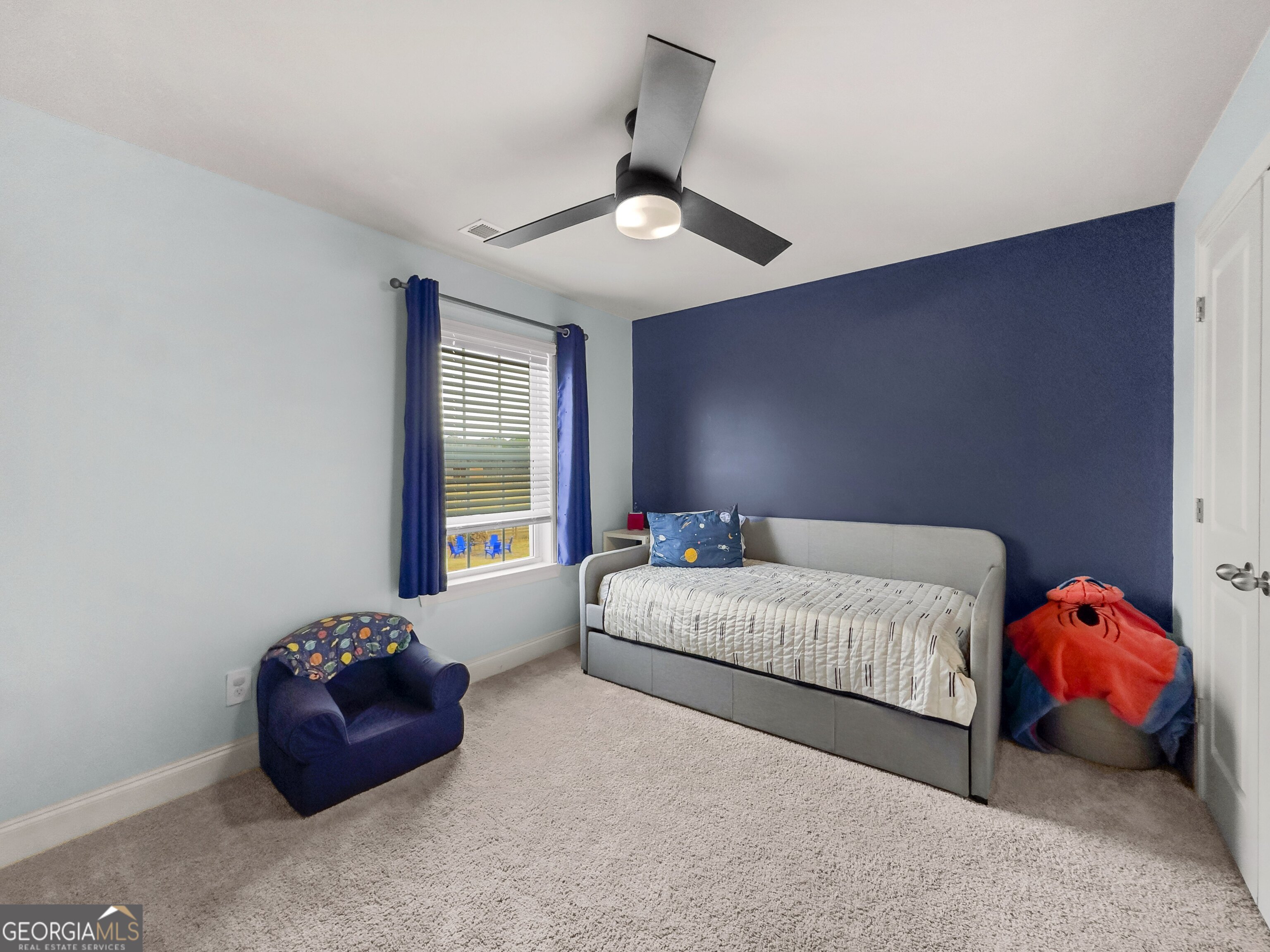 35 Sandy Ridge Road McDonough, GA 30252 - Photo 58 of 63 a bedroom with bed and window