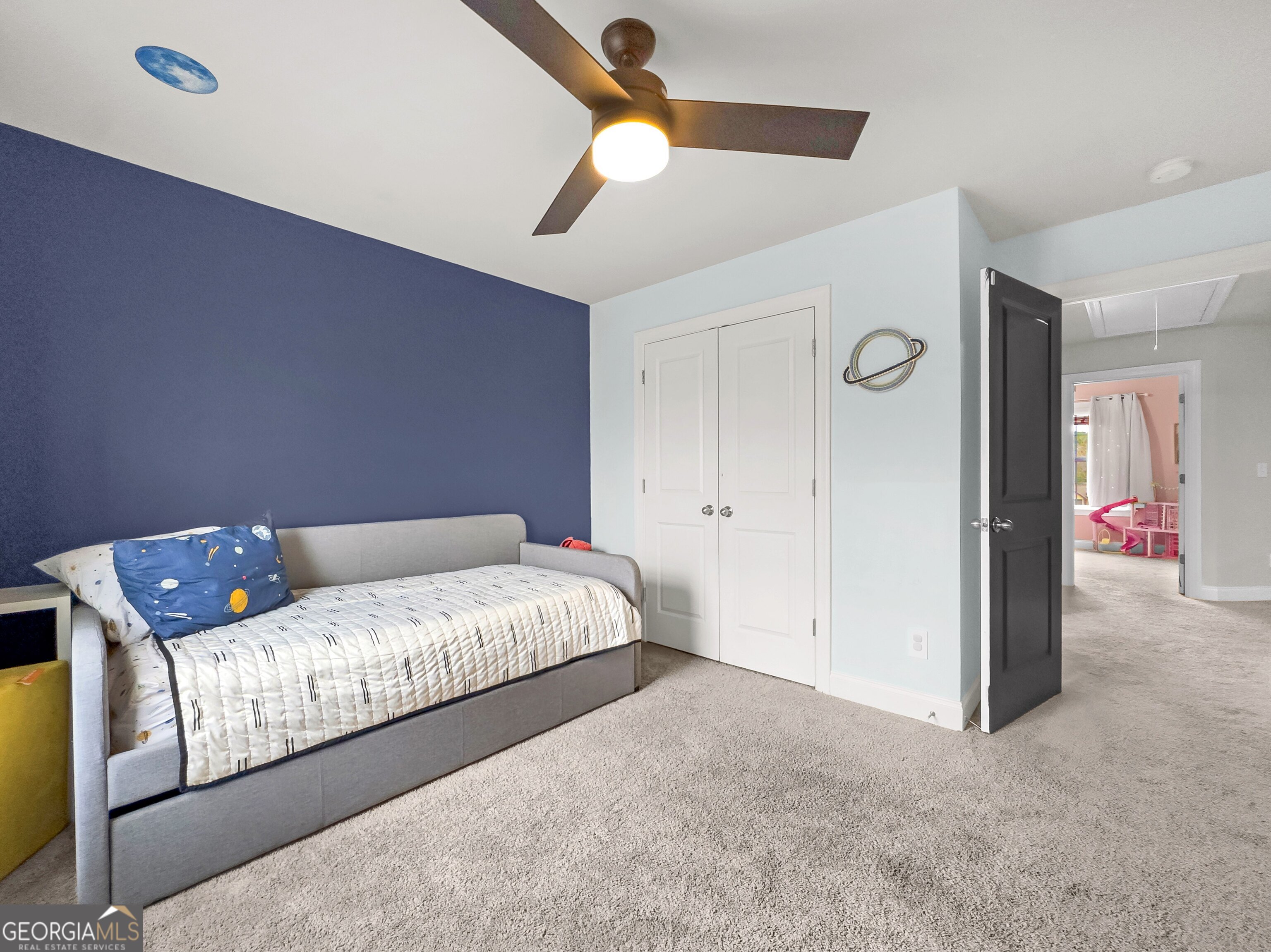 35 Sandy Ridge Road McDonough, GA 30252 - Photo 59 of 63 a bedroom with a bed and a chandelier