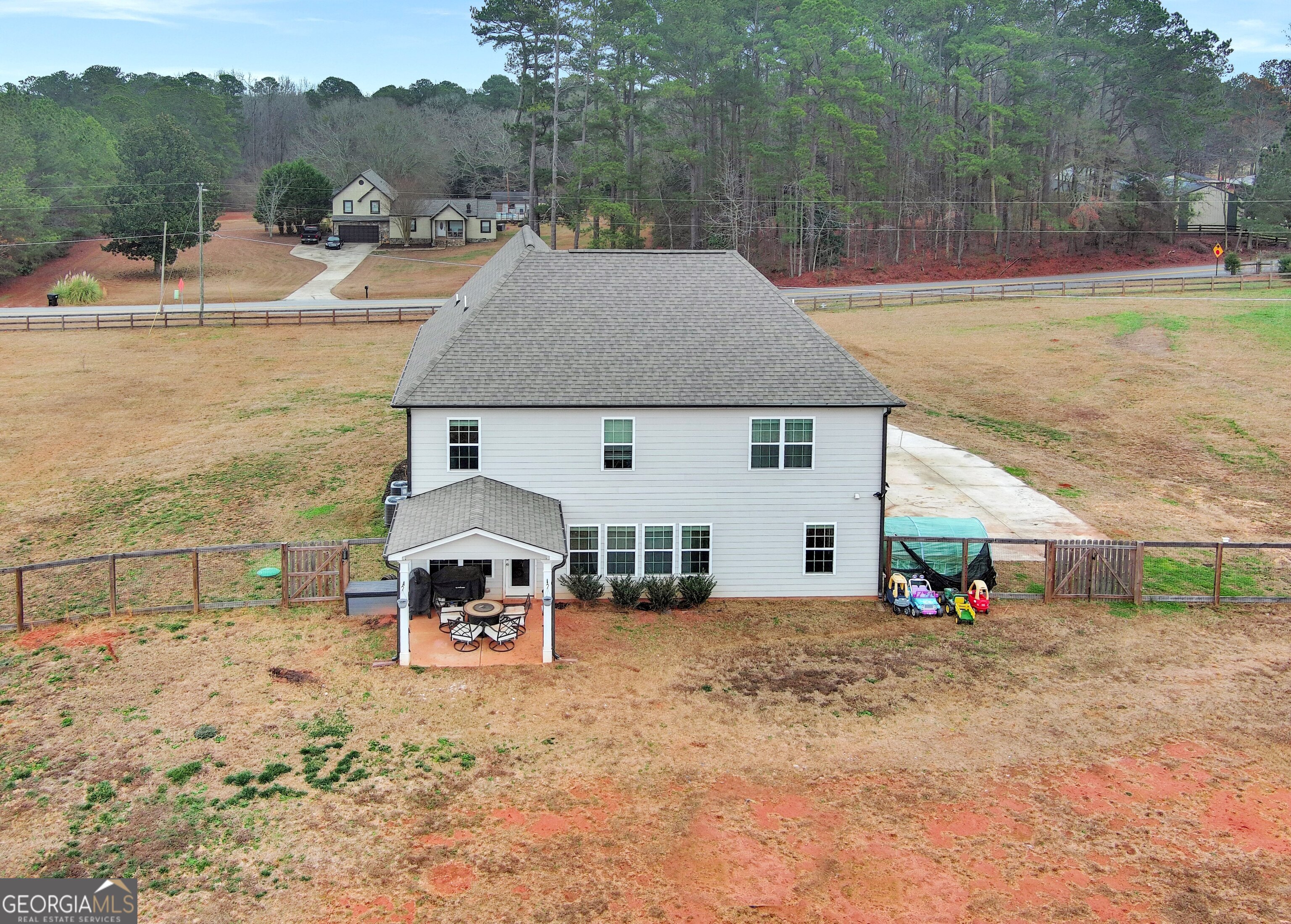 35 Sandy Ridge Road McDonough, GA 30252 - Photo 6 of 63 aerial view of a house with a patio