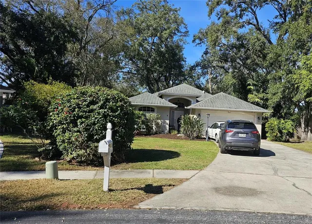 a view of a house with a garden