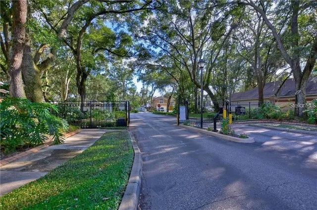 a view of a house with a tree