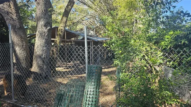a view of outdoor sitting area with chairs