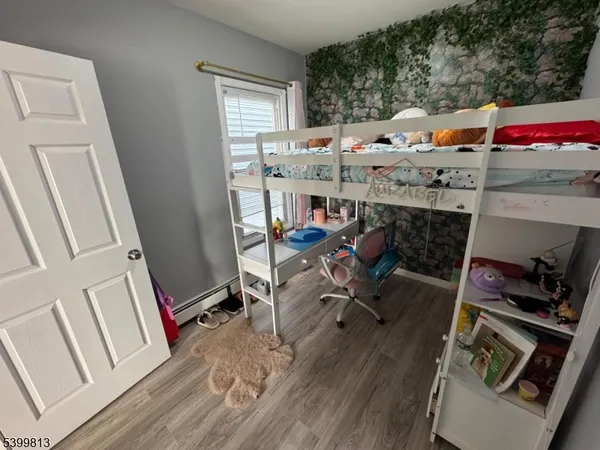 a room with furniture and a fireplace