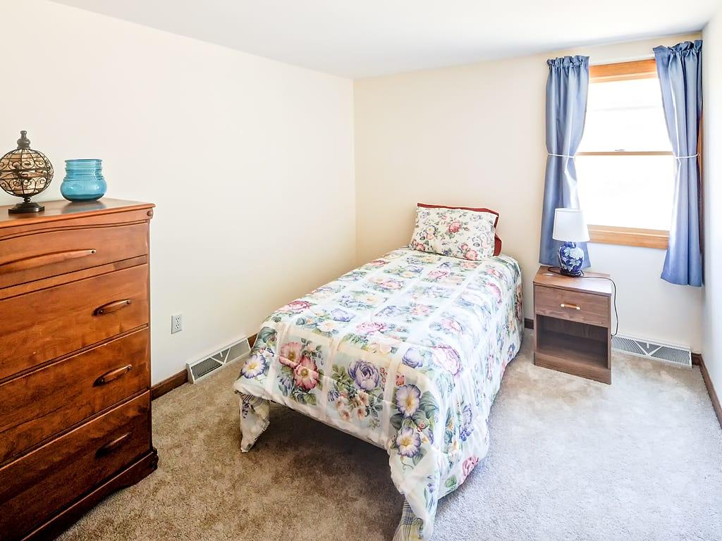 281 South Sandwich Road Mashpee, MA 02649 - Photo 14 of 25 a bedroom with a bed and a window