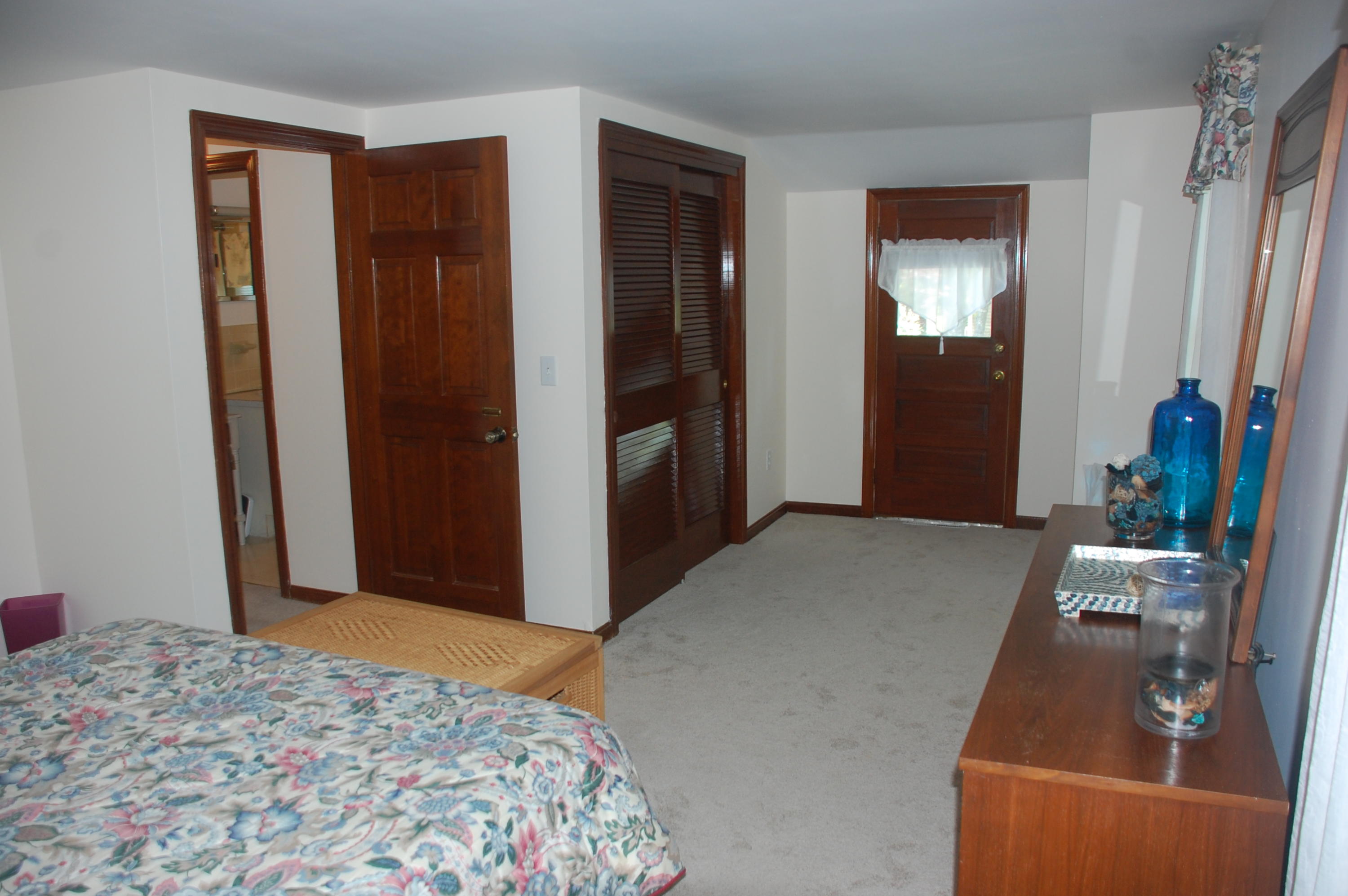 281 South Sandwich Road Mashpee, MA 02649 - Photo 16 of 25 a bedroom with a bed and a mirror