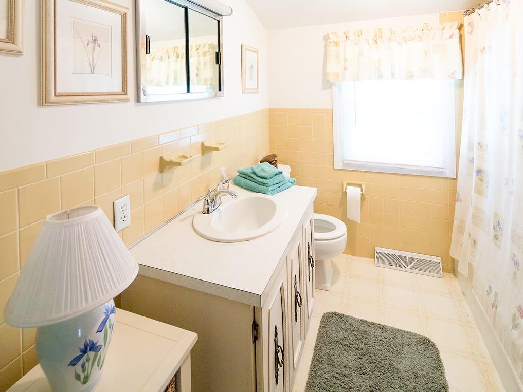 281 South Sandwich Road Mashpee, MA 02649 - Photo 18 of 25 a bathroom with a sink mirror vanity and toilet