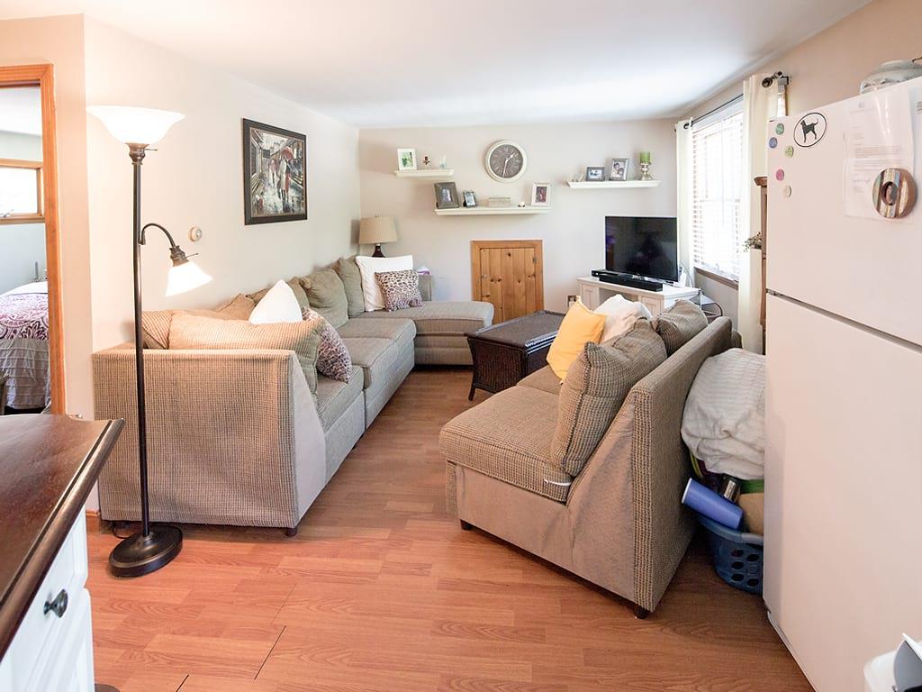 281 South Sandwich Road Mashpee, MA 02649 - Photo 21 of 25 a living room with furniture and a flat screen tv
