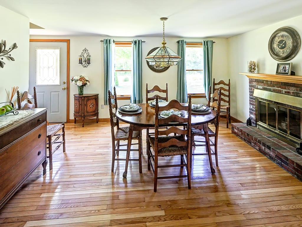 281 South Sandwich Road Mashpee, MA 02649 - Photo 10 of 25 a view of a dining room with furniture window and wooden floor