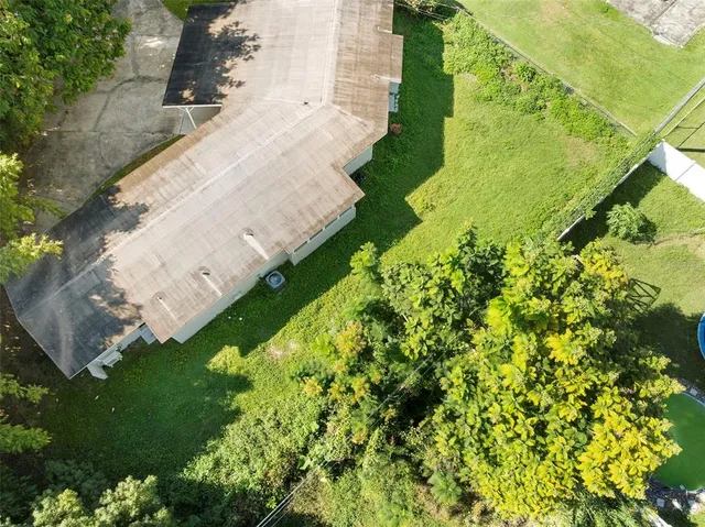 a kitchen with a refrigerator and a sink
