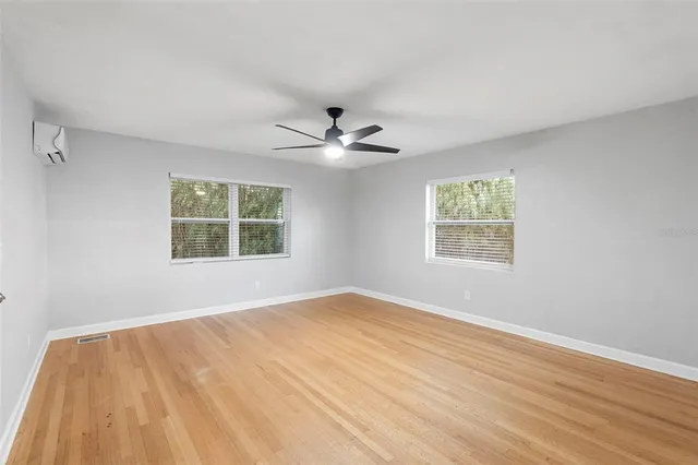 a bathroom with a shower and a bathtub