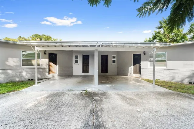 a house view with a garden space