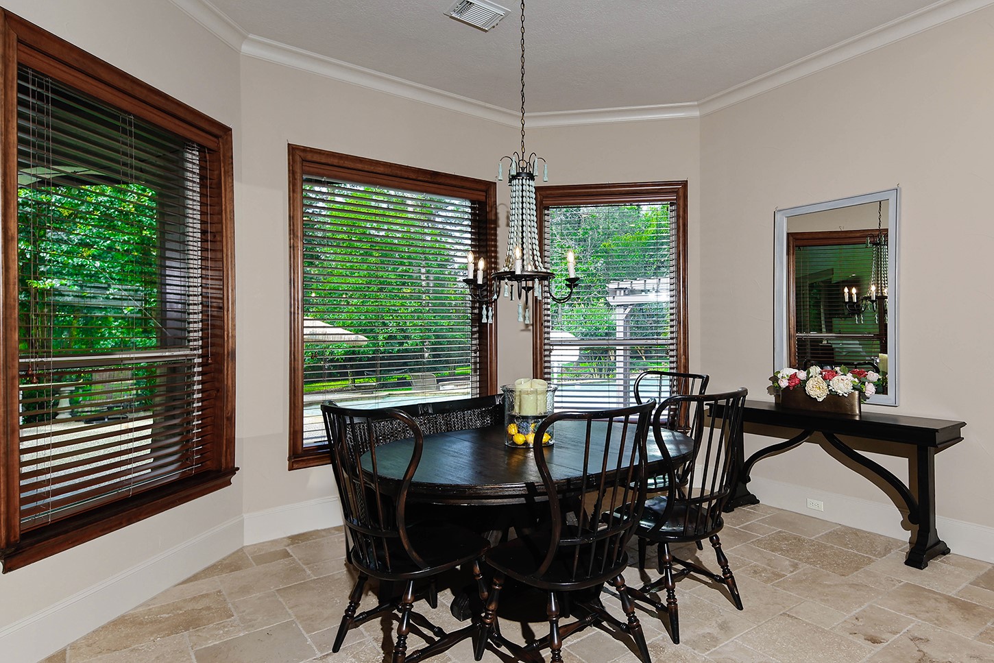 119 Angel Leaf Road The Woodlands, TX 77380 - Photo 17 of 50 a view of a dining room with furniture window and outside view