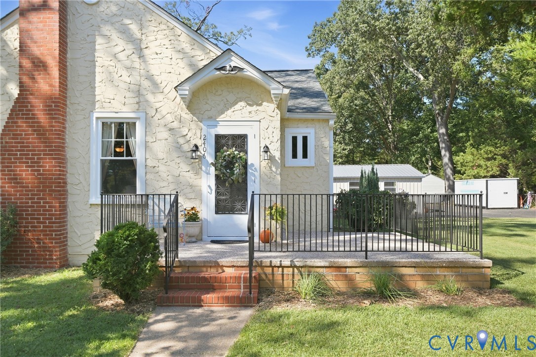 A welcoming front porch offers the perfect place t