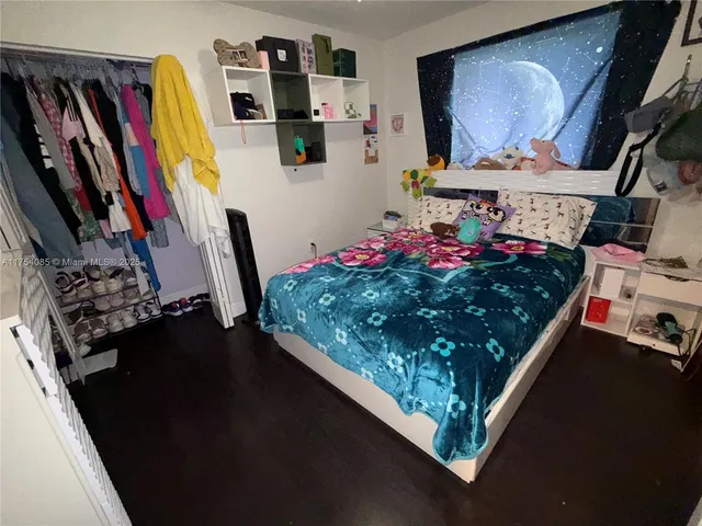 a room with lots of different colored cloths